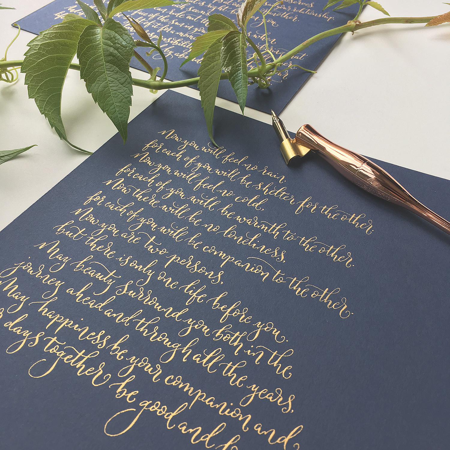 Gold upright modern calligraphy on a navy blue background - Apache Wedding Blessing