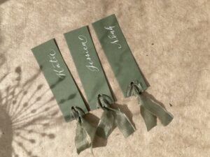 Olive green place names with olive silk ribbon