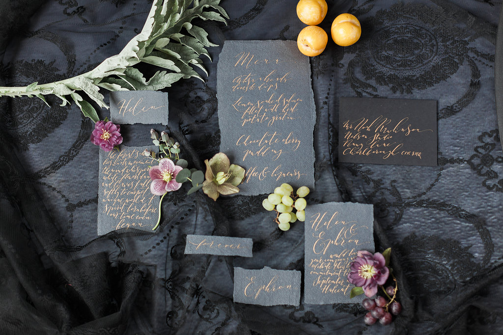 dark and dramatic alternative wedding stationery with calligraphy