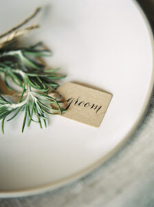 tiny wedding name tag on recycled Kraft card with calligraphy