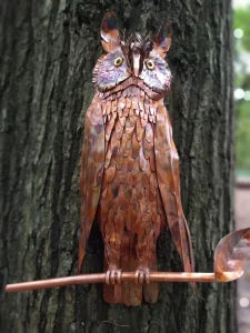 Copper owl sculpture