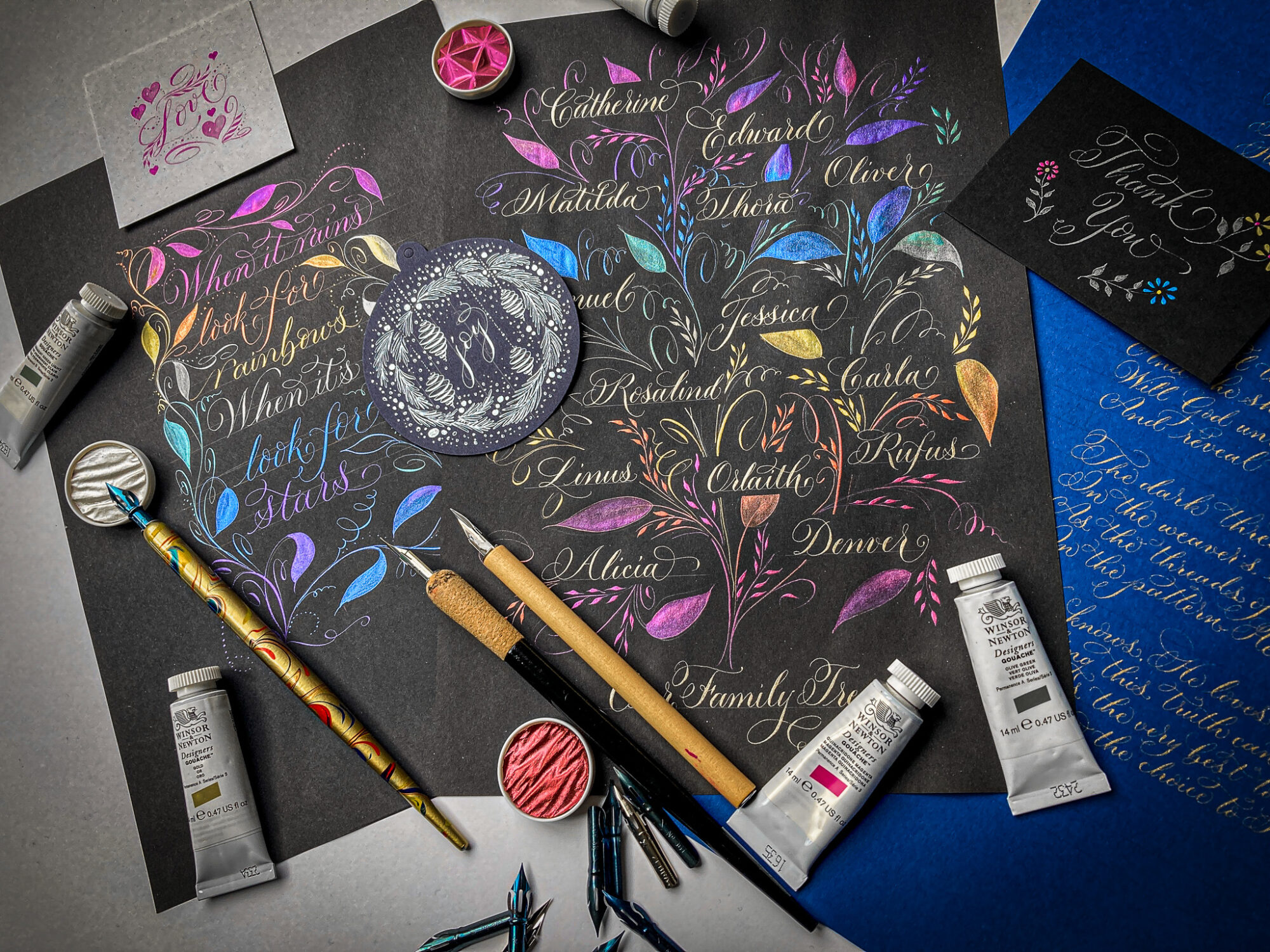 modern calligraphy examples with flourishing and supplies