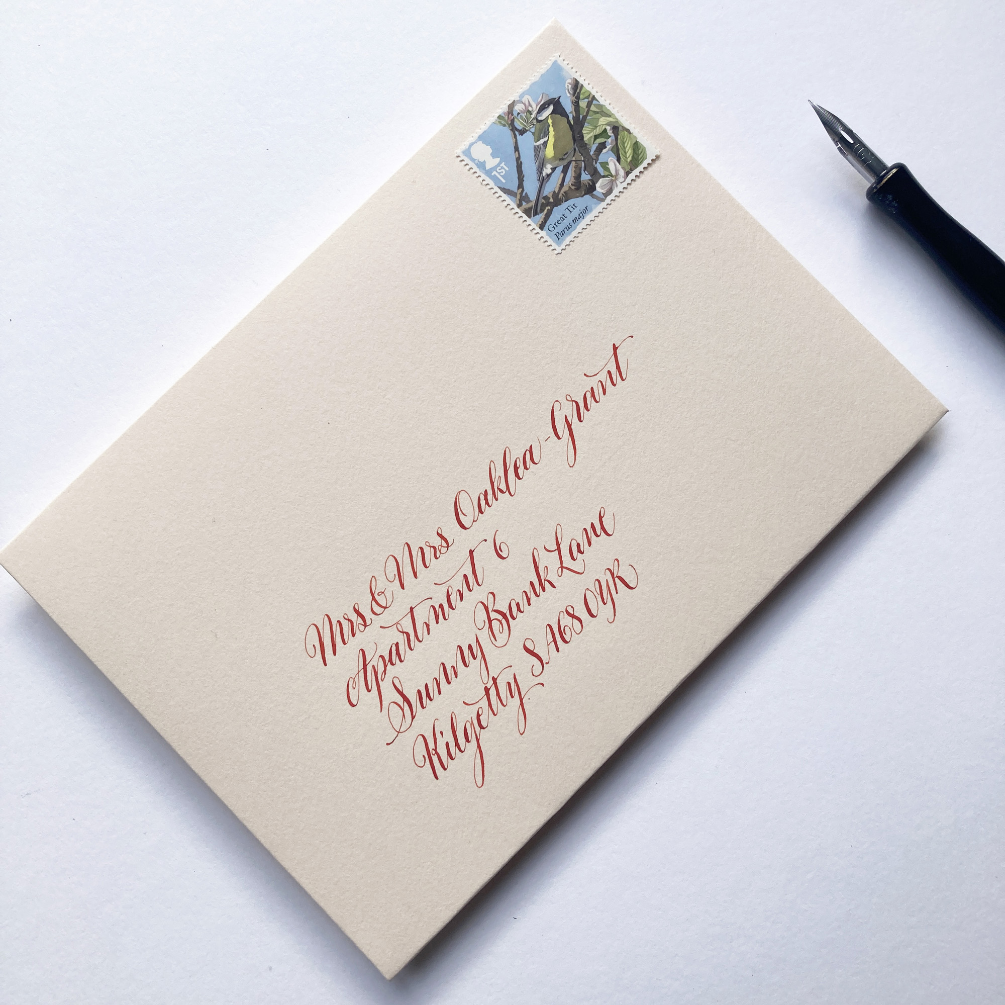 Romantic modern calligraphy on a wedding invitation envelope