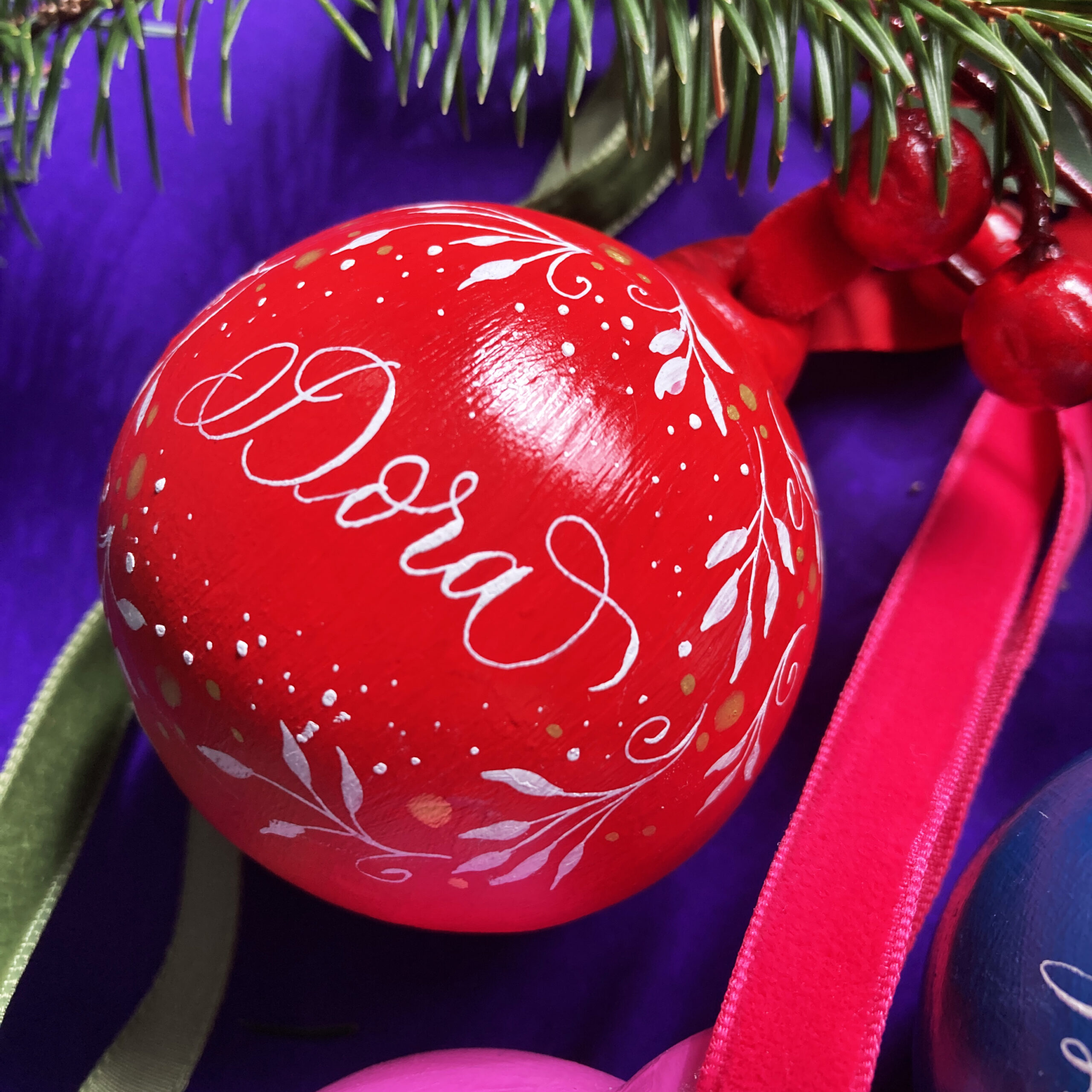 personalised bauble with calligraphy name handmade in the UK