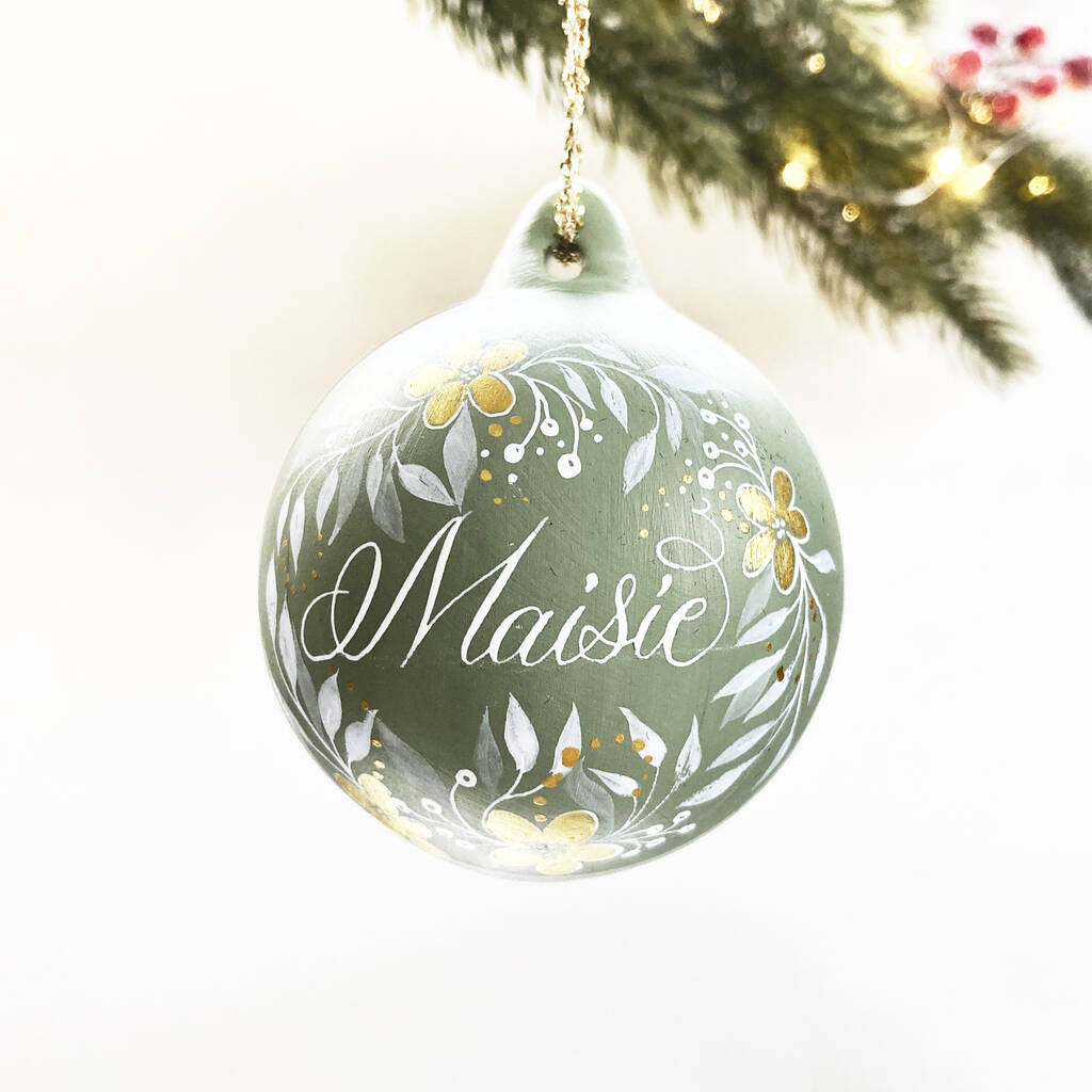 personalised Christmas name bauble made in the UK with calligraphy