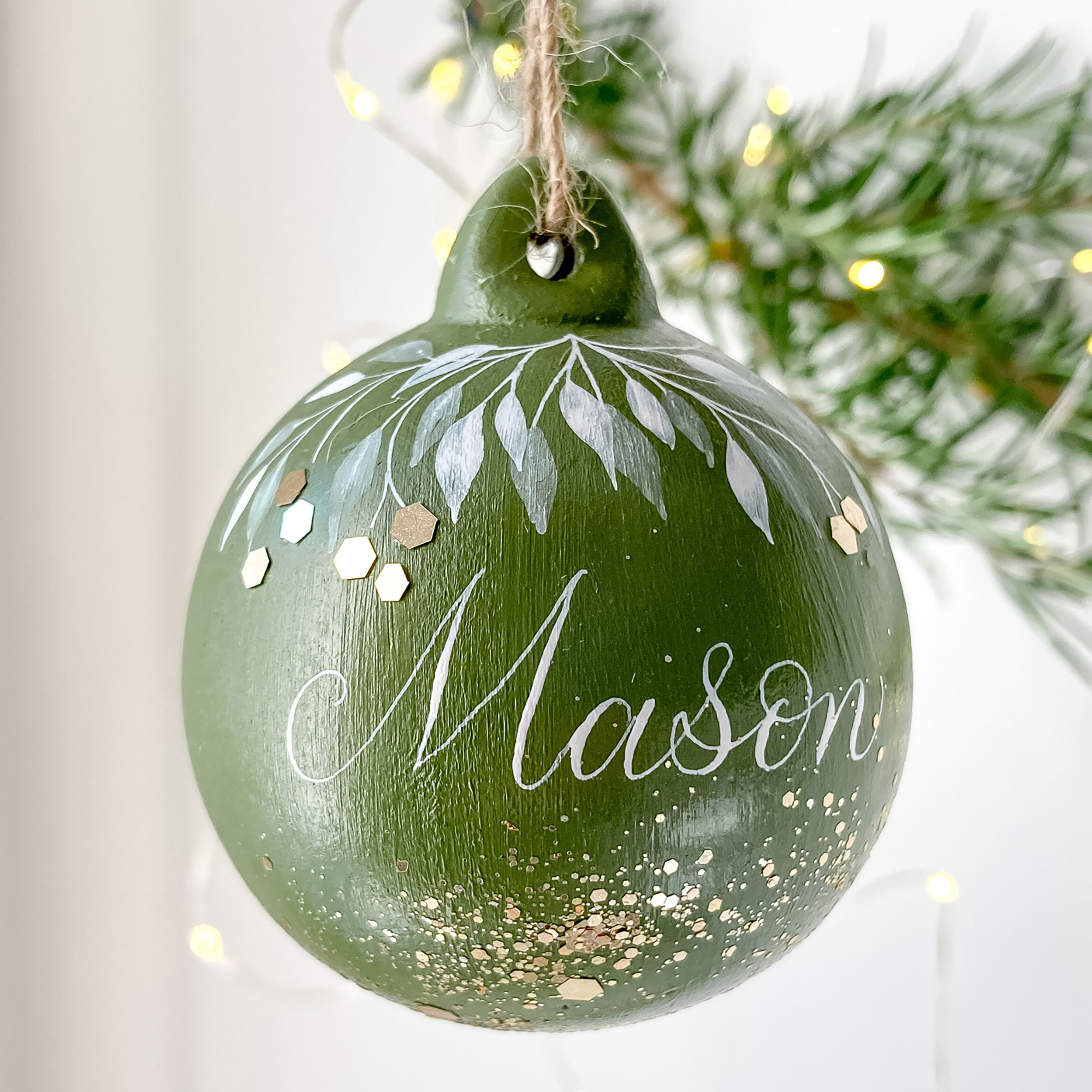 personalised bauble with calligraphy name handmade in the UK