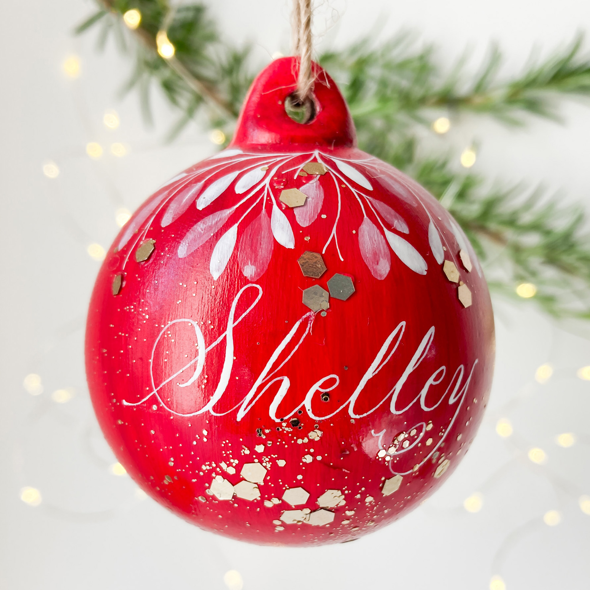 personalised bauble with calligraphy name handmade in the UK