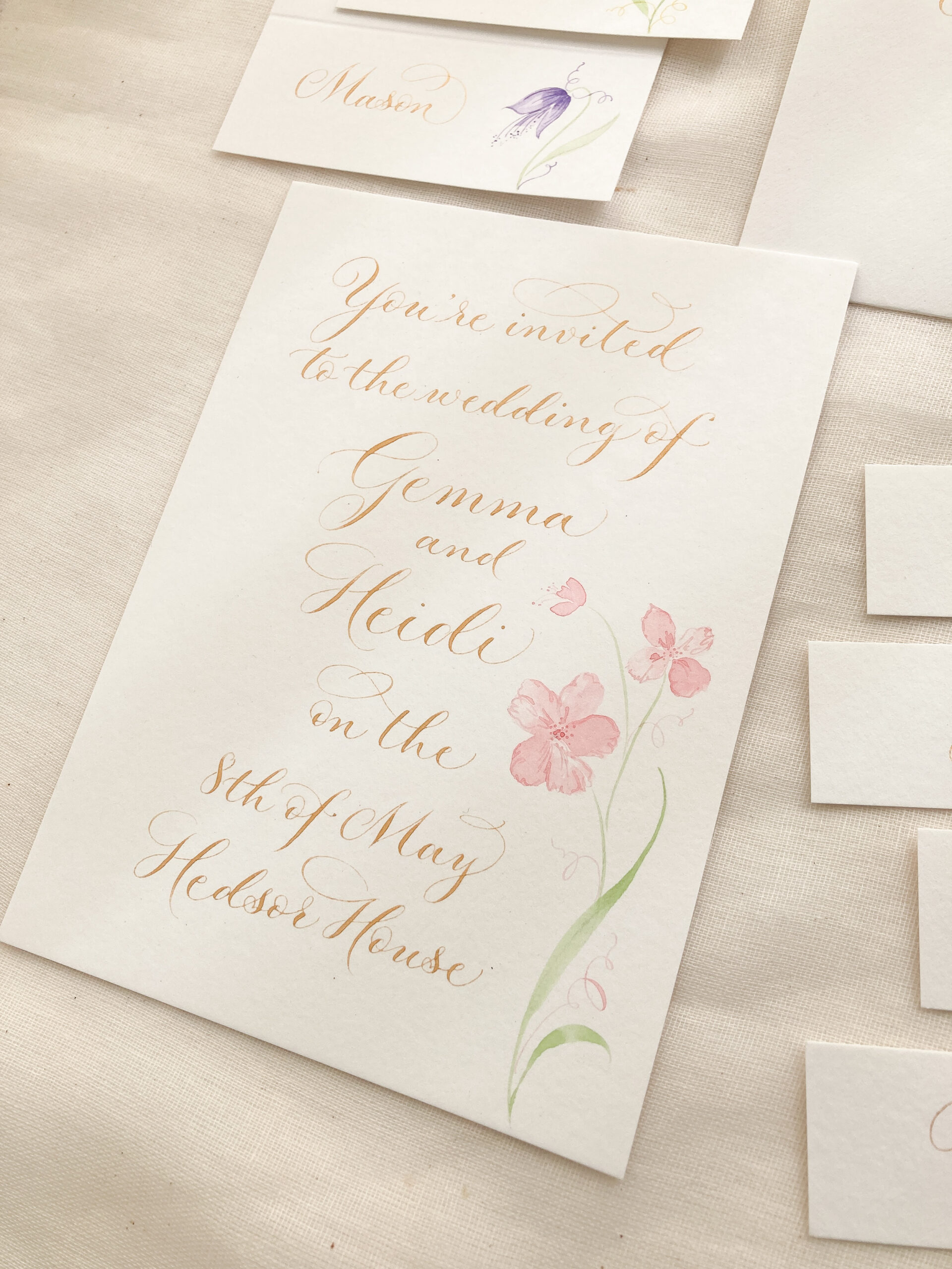 Handwritten calligraphy wedding invitation for a LGBTQ couple