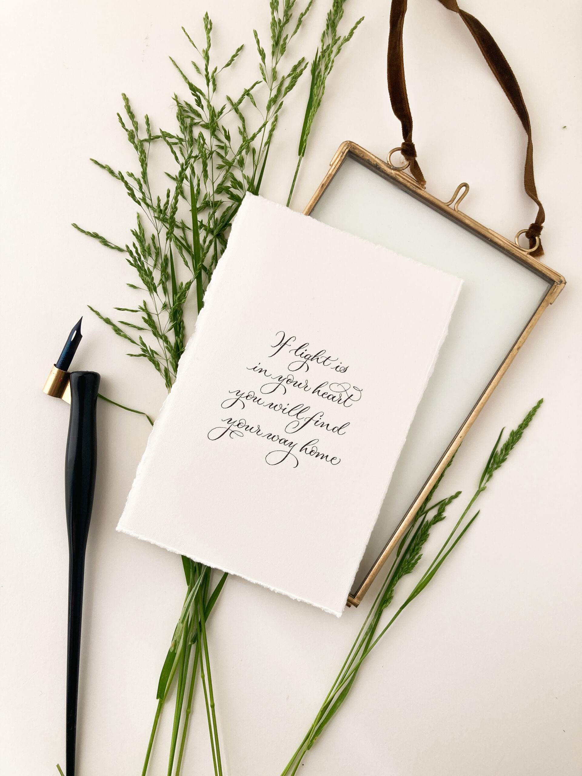 hand written calligraphy quote in a rustic brass frame from By Moon and Tide Calligraphy