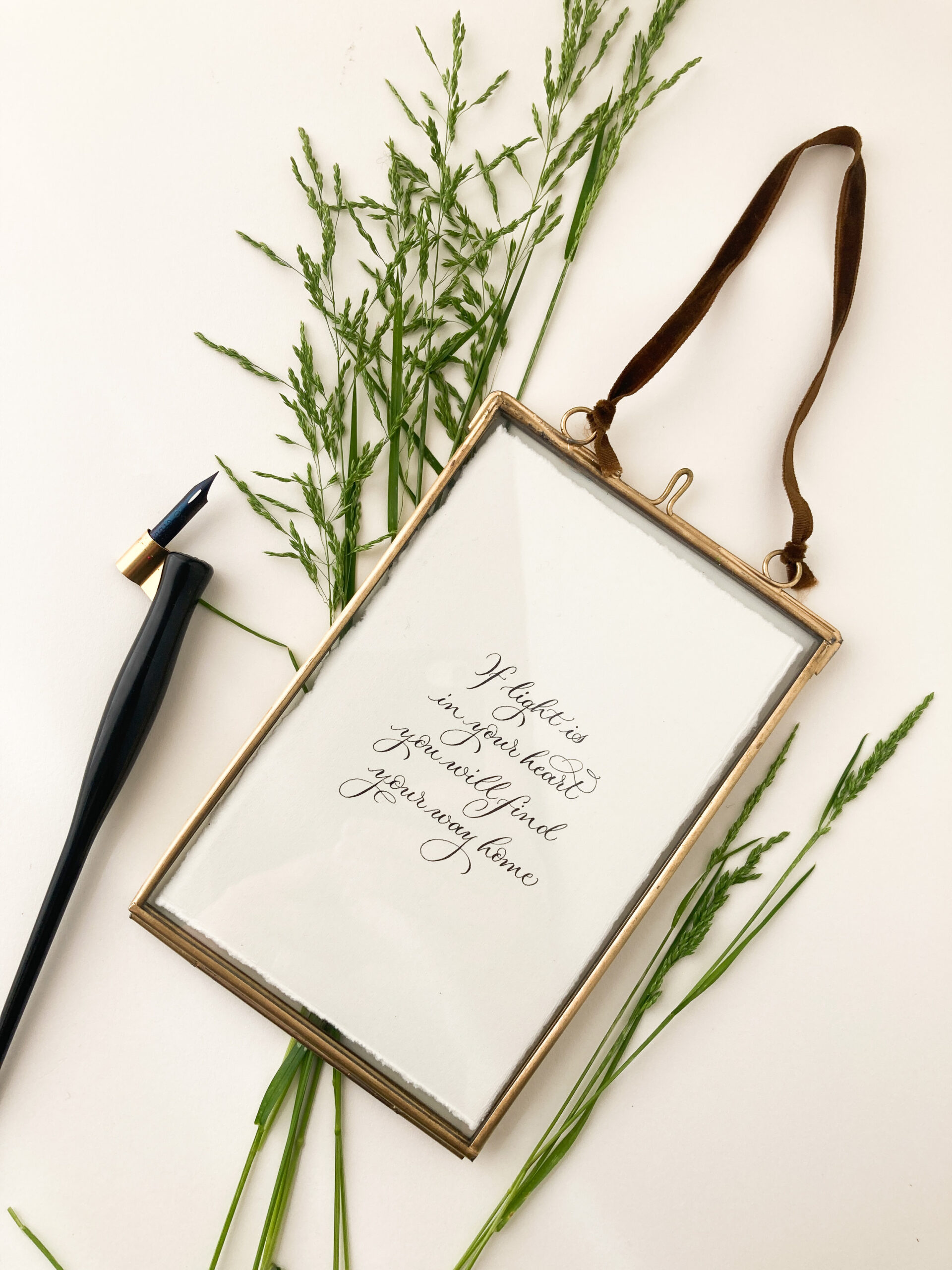 simple handwritten calligraphy quote in a rustic frame | By Moon and Tide Calligraphy by Claire Gould Cumbria UK