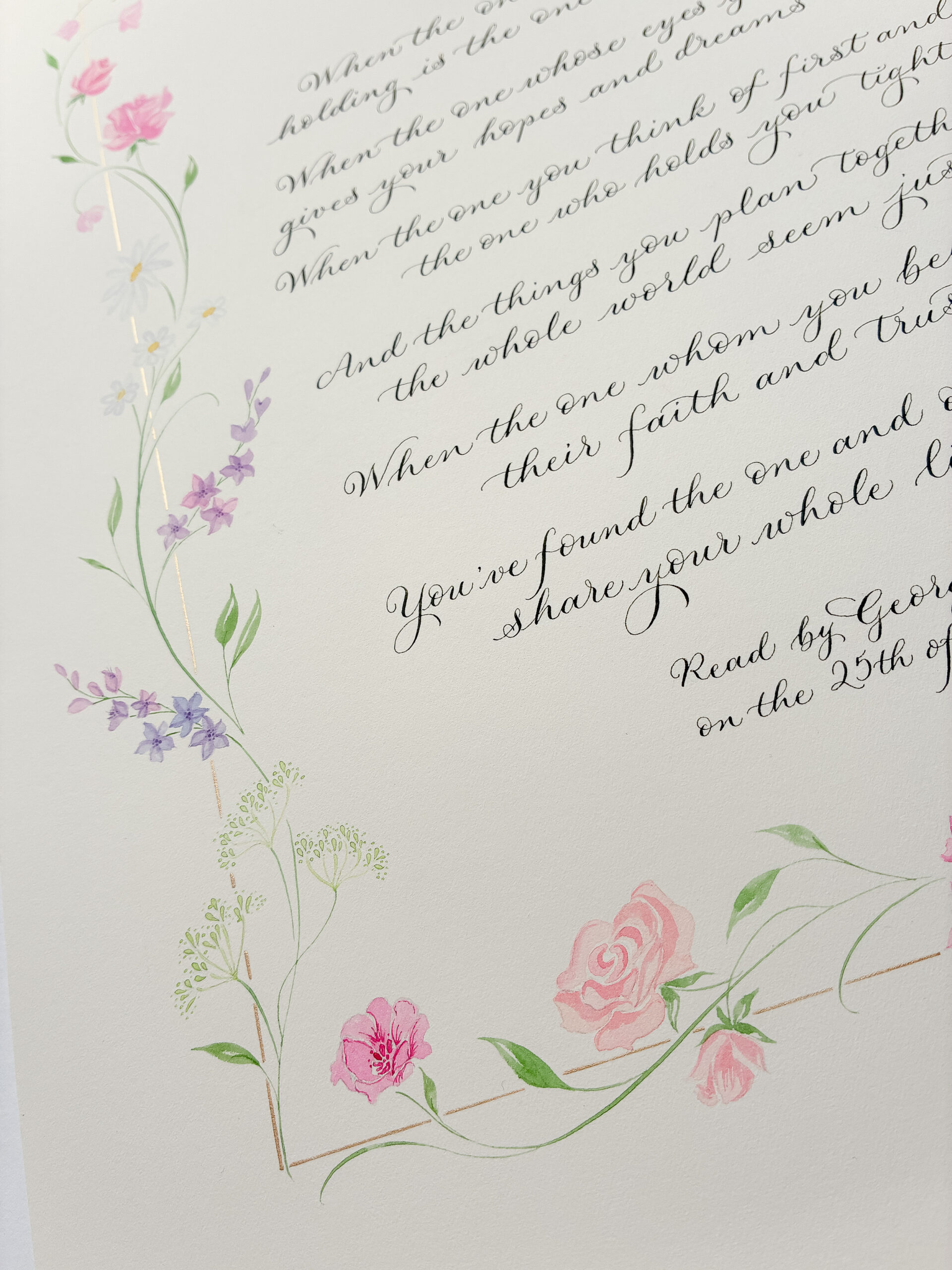 Calligraphy detail of one edge of a poem commission with illustrated border of purple delphiniums, fennel flowers, rose and lisianthus
