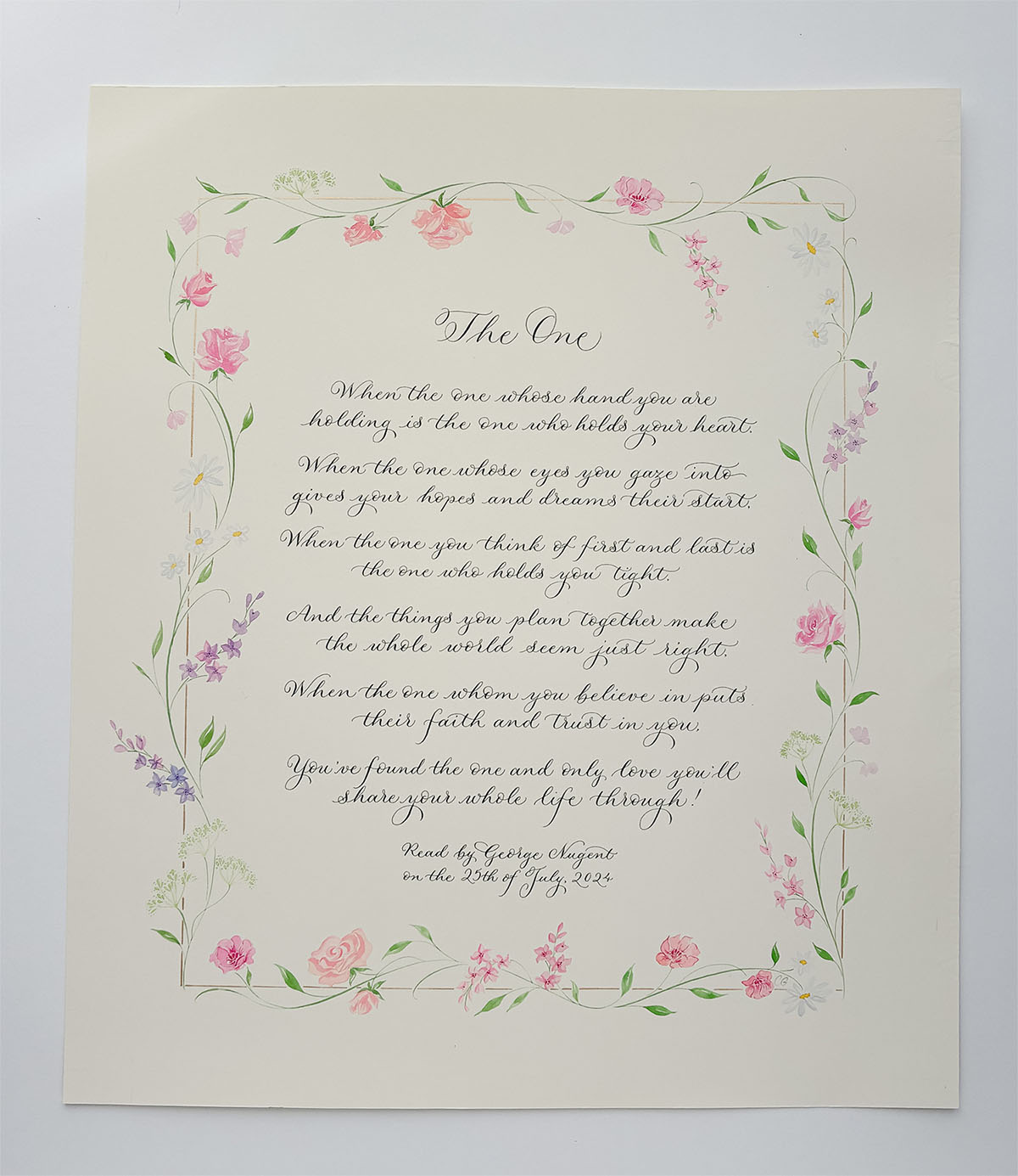 Calligraphy poem with a rectangular pale gold border illustrated with delicate summer florals