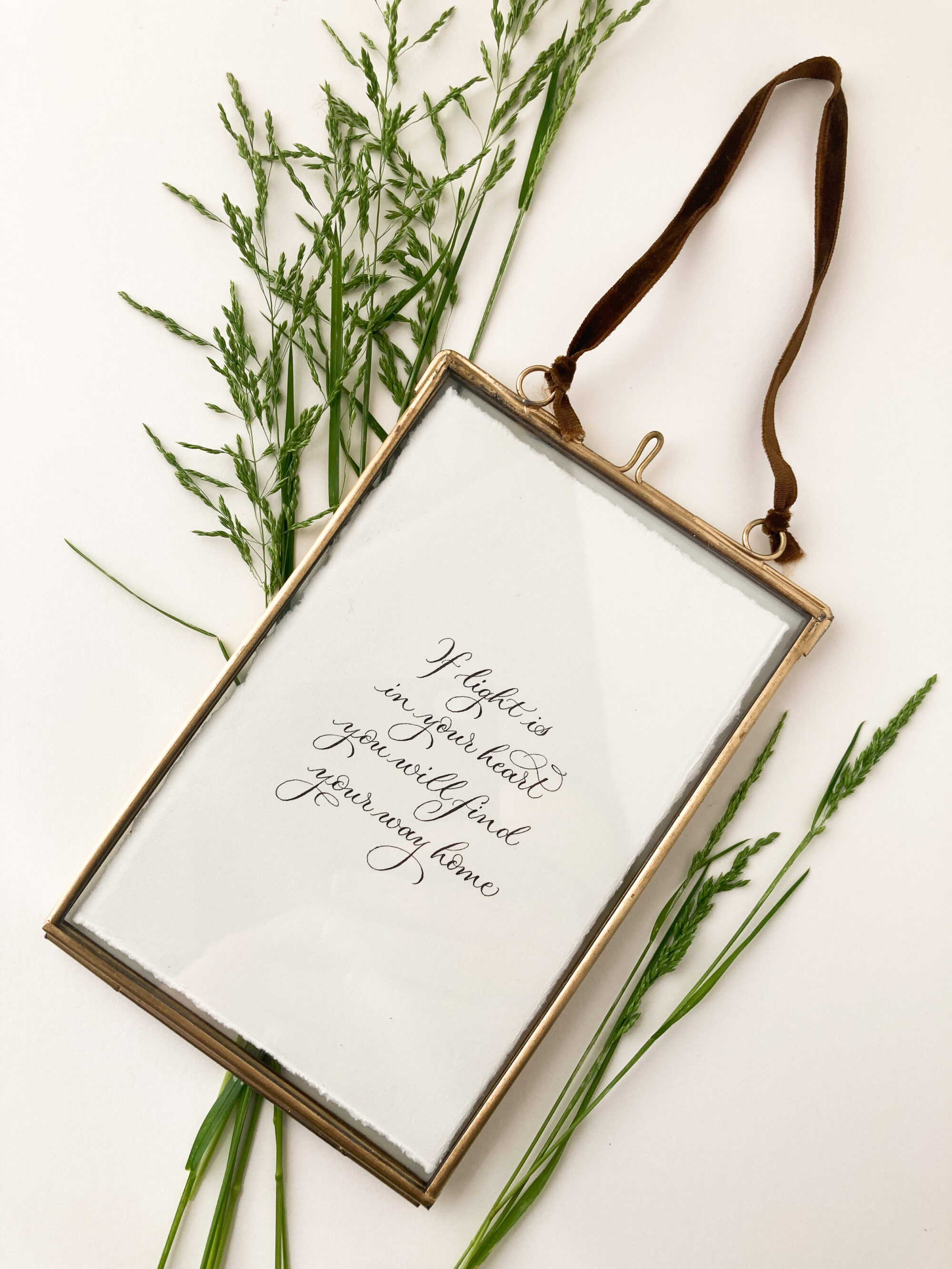 small calligraphy quote in rustic brass frame - handwritten by Claire at By Moon and Tide Calligraphy Cumbria UK
